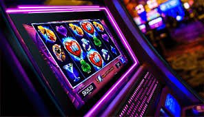 Mobile phone screen showing liga8et login Slot Games interface with multiple game tiles